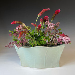 many styles and sizes of vases for one flower or a large burst of flowers